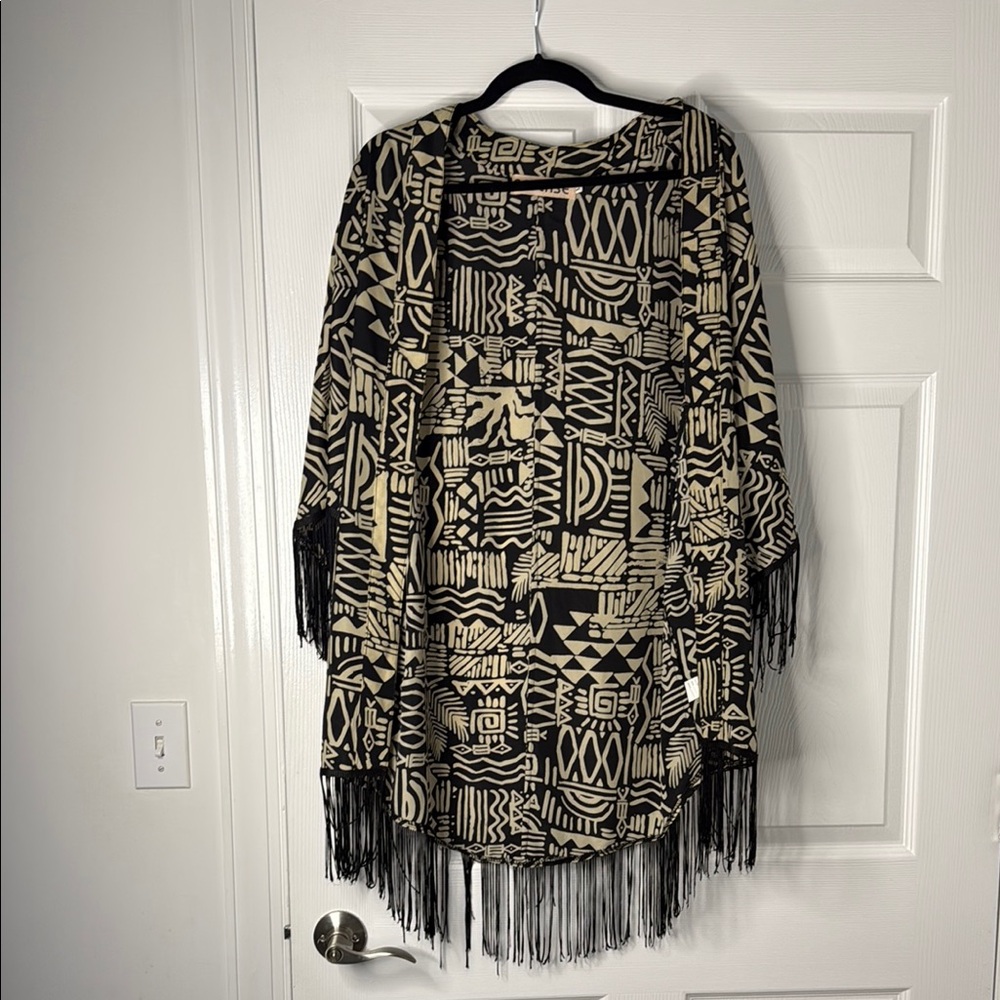 Reverse Black and Cream Geometric Fringe Cape